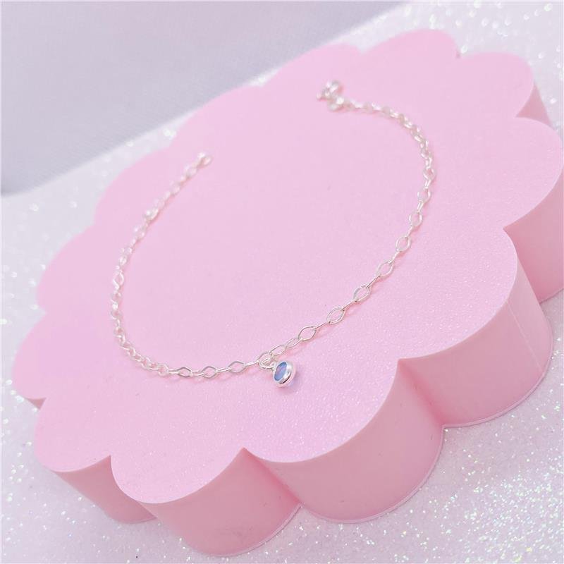 PULSEIRA COM 1 PINGENTE AZUL CLARO